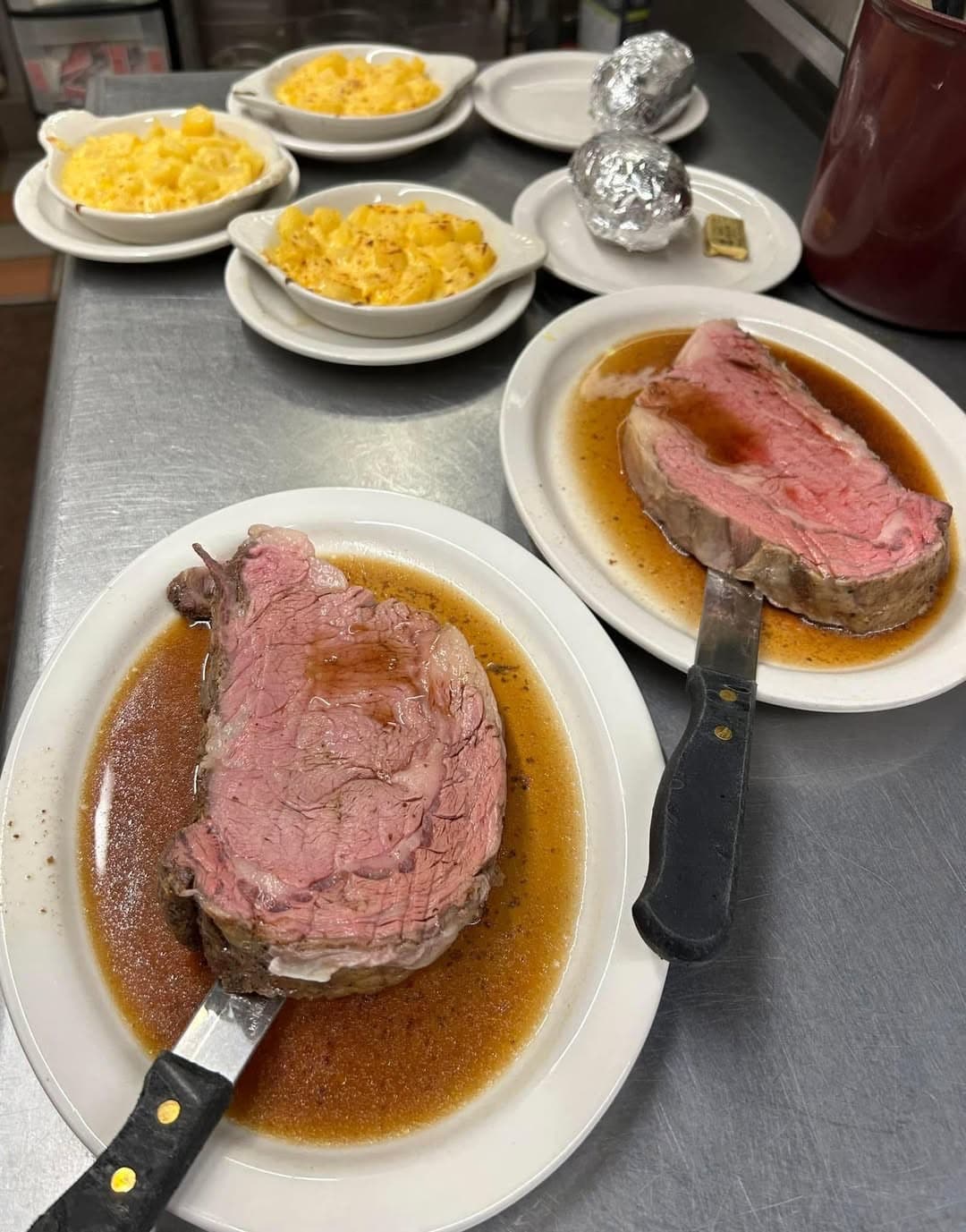 Two plates of prime rib with mac and cheese, from the House of Coates Facebook page.